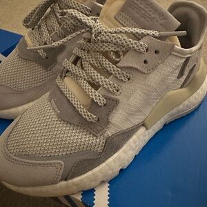 Adidas Gray and Cream Nite Jogger Sneakers.
